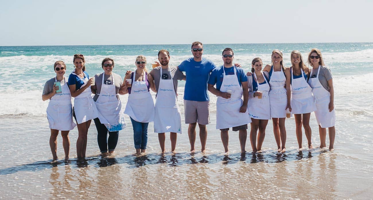 TriMark employees participating in a team-building beach outing