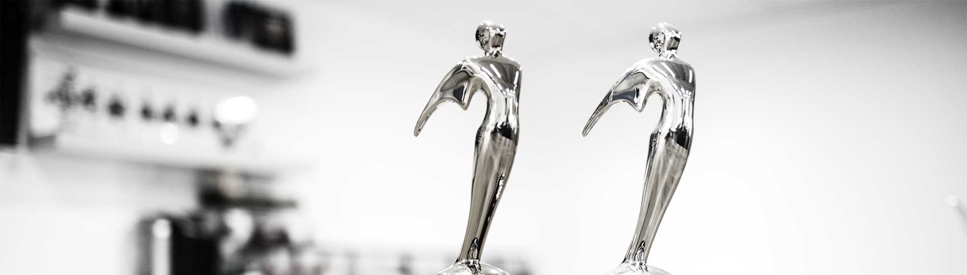 Two Telly Awards statues