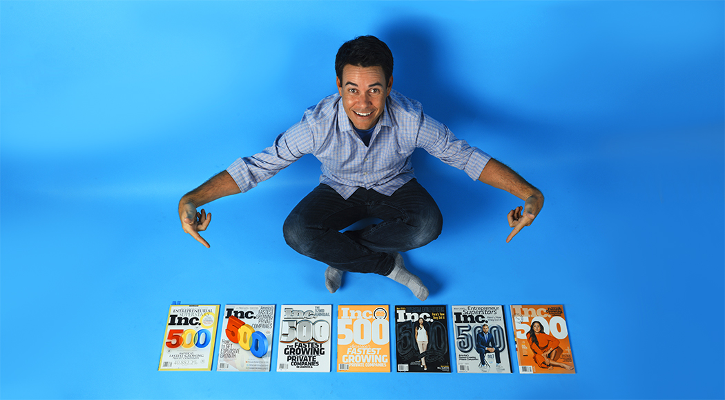 randy goins sitting in front of his inc 500 magazines