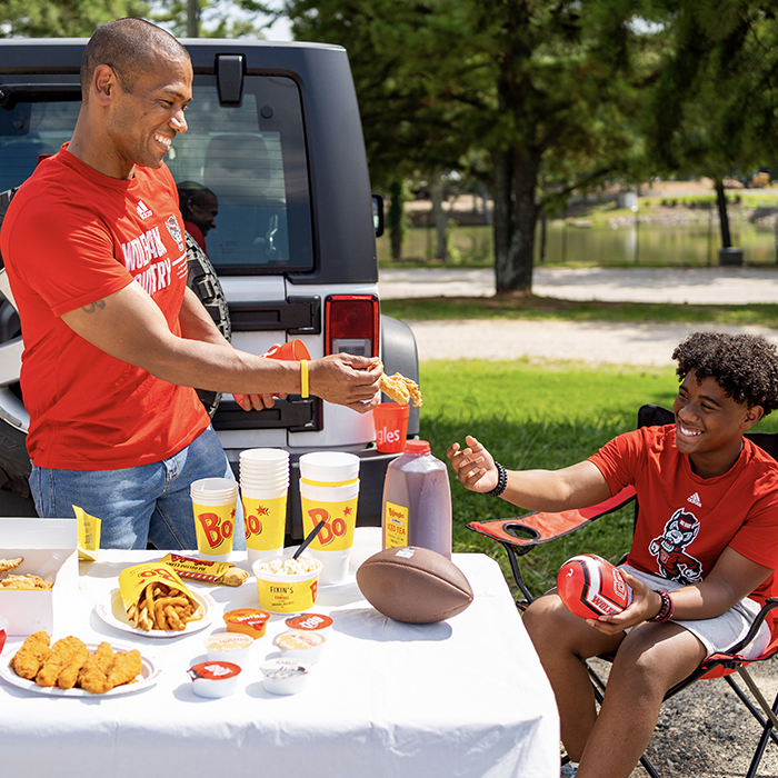 North Carolina State fan Tailgaters enjoying Bojangles