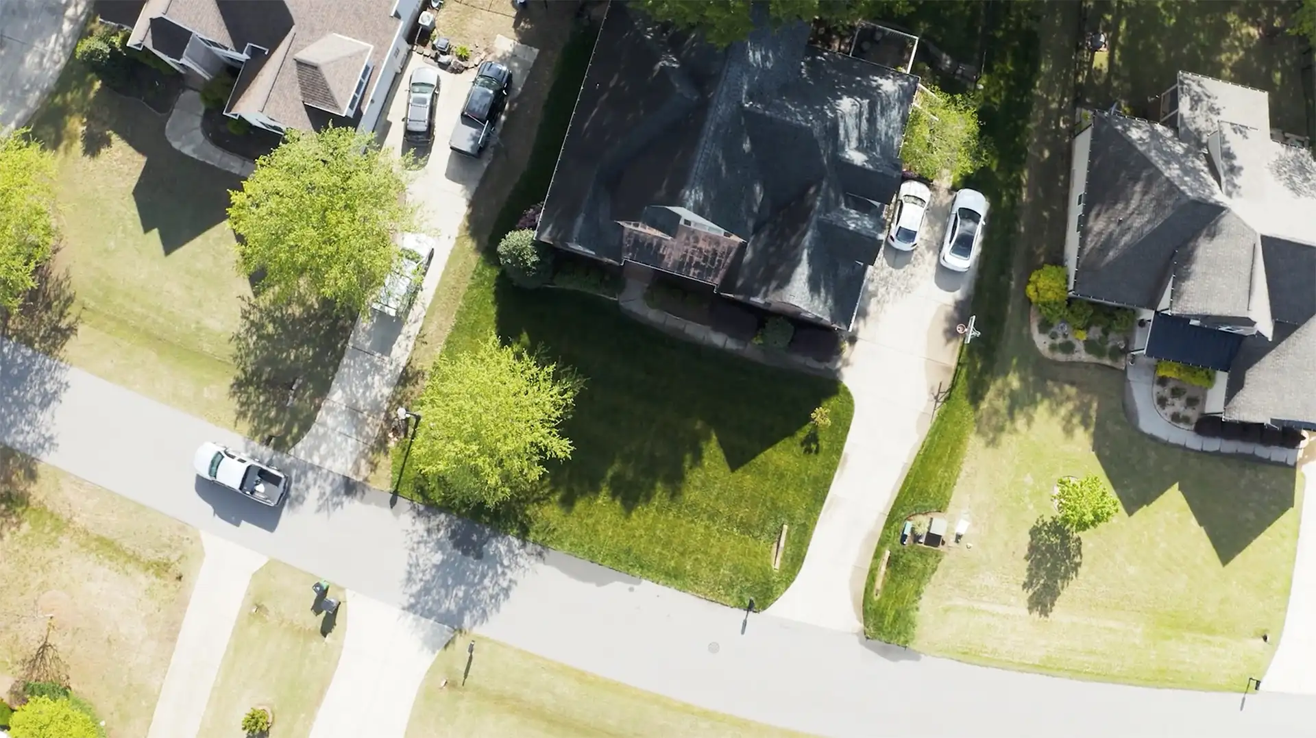 Neighborhood shot overhead of lawns