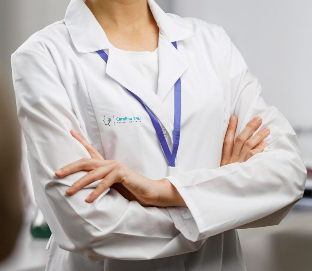 Carolina TMJ brand application on coat