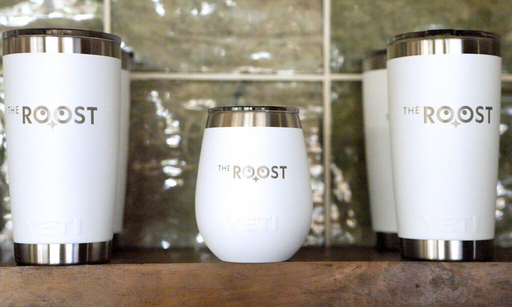 The Roost tumbler branding